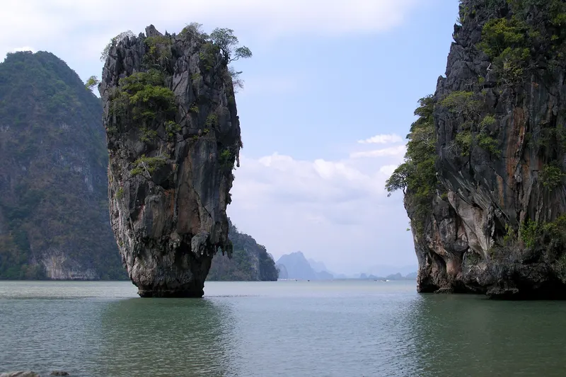 Koh Tapu, the limestone pinnacle of Phang Nga Bay, rising from green water