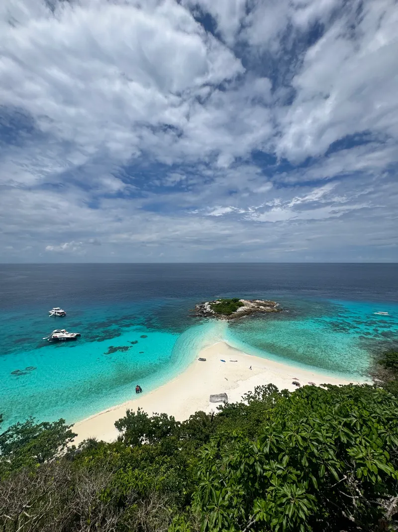 The white sandbar of Koh Racha Noi from above, boats anchored in the shallows
