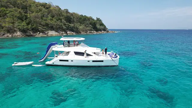 Leopard 51 Se La Vie — at anchor off the island with the water slide