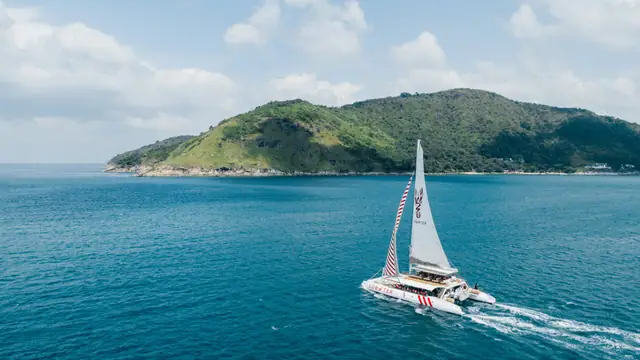 Lobster 78 — sailing off an island